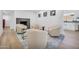 Open seating area featuring modern fireplace, contemporary decor, and comfortable chairs at 2202 E Lincoln Dr, Phoenix, AZ 85016