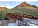 Phoenix mountain bridge with brown railings, with a glimpse of the mountain behind it at 2202 E Lincoln Dr, Phoenix, AZ 85016