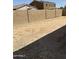 Spacious backyard with a block wall, offering privacy and potential for customization at 25766 W Valley View Dr, Buckeye, AZ 85326