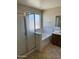 Bathroom featuring a shower, tub, and vanity with tile flooring, providing a functional space at 25766 W Valley View Dr, Buckeye, AZ 85326