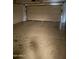 Clean and spacious garage with a white garage door, offering parking and storage space at 25766 W Valley View Dr, Buckeye, AZ 85326