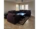 Inviting living room featuring tile floors, a ceiling fan, and a comfortable floral sofa set at 25766 W Valley View Dr, Buckeye, AZ 85326