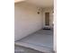 Covered patio with concrete flooring and access to the backyard through sliding glass doors at 25766 W Valley View Dr, Buckeye, AZ 85326