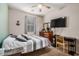 Bedroom with carpet, ceiling fan, natural light, and desk at 291 N Scott Dr, Chandler, AZ 85225