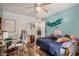 A spacious bedroom featuring laminate wood floors and natural light at 291 N Scott Dr, Chandler, AZ 85225