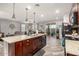 Spacious kitchen with island, stainless steel appliances, and open layout to the rest of the house at 291 N Scott Dr, Chandler, AZ 85225