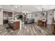 Open-concept living space with living, dining, and kitchen areas and lots of natural light at 291 N Scott Dr, Chandler, AZ 85225
