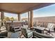 Inviting covered patio features a hot tub, barbecue, fire pit, and ample seating for entertainment at 291 N Scott Dr, Chandler, AZ 85225