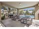 Community picnic area features several tables, barbecue, and view of pool at 291 N Scott Dr, Chandler, AZ 85225