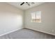 Neutral bedroom with plush carpet, paint color, and window for natural light at 3240 W Desierto Dr, Eloy, AZ 85131