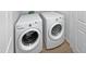 A convenient laundry room with a side-by-side washer and dryer at 3316 W Hayduk Rd, Laveen, AZ 85339