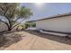 The backyard has a long brick trimmed border and view of the pool at 3369 W Sandra Ter, Phoenix, AZ 85053