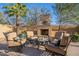 Inviting outdoor fireplace with comfortable seating, perfect for entertaining and relaxation at 3859 E Wood Dr, Chandler, AZ 85249