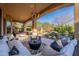 Inviting outdoor patio area with comfortable seating and a view of the pool at 3859 E Wood Dr, Chandler, AZ 85249