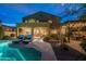 Lounge chairs by sparkling pool and covered patio, perfect for relaxing and entertaining at 3859 E Wood Dr, Chandler, AZ 85249