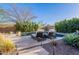 Sparkling backyard pool with sun loungers, desert landscaping, and a serene ambiance at 3859 E Wood Dr, Chandler, AZ 85249
