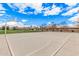 Community basketball court for outdoor recreation featuring clear skies, greenery, and neighborhood views at 3938 E Morrison Ranch Pkwy, Gilbert, AZ 85296