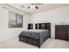 Bedroom with a ceiling fan, a window, and carpet at 3938 E Morrison Ranch Pkwy, Gilbert, AZ 85296