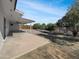 Expansive backyard with mature trees, a covered patio, and plenty of room for outdoor activities and entertaining at 4237 E Clovis Ave, Mesa, AZ 85206