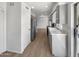 Updated kitchen with white countertops, modern appliances, and ample cabinet space for storage and convenience at 4237 E Clovis Ave, Mesa, AZ 85206