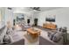 Inviting living room featuring stylish decor, comfortable seating, and a seamless flow to the dining area at 4237 E Clovis Ave, Mesa, AZ 85206