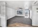 Open-concept living room with neutral carpet and stylish interior, filled with natural light at 4237 E Clovis Ave, Mesa, AZ 85206