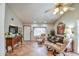 Comfortable living room featuring tile floors, comfortable seating, and a large window at 542 S Higley Rd # 102, Mesa, AZ 85206