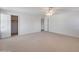 Large bedroom with walk-in closet and ceiling fan at 5778 W Corrine Dr, Glendale, AZ 85304