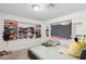 Bright bedroom featuring white walls, built in closet shelves, carpeted floors and a cozy atmosphere at 6541 N 41St Ave, Phoenix, AZ 85019
