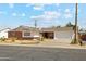 Charming brick home with a well-manicured front yard and attached two-car garage at 6541 N 41St Ave, Phoenix, AZ 85019
