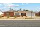 Charming brick home with a well-manicured front yard and attached two-car garage at 6541 N 41St Ave, Phoenix, AZ 85019