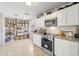 Updated kitchen with stainless steel appliances, granite countertops, and ample cabinet space at 6541 N 41St Ave, Phoenix, AZ 85019