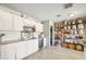 Bright, renovated kitchen featuring modern appliances, granite counters, and lots of storage space at 6541 N 41St Ave, Phoenix, AZ 85019