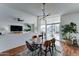 Dining room featuring a modern light fixture, and view to the living area at 6851 E Windsor Ave, Scottsdale, AZ 85257