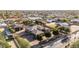 Impressive aerial view of a sprawling property featuring a well-maintained home, lush landscaping, and a private gated entrance at 7215 W Union Hills Dr, Glendale, AZ 85308