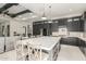 A gourmet kitchen boasts a large island with seating and connects to the living area at 7215 W Union Hills Dr, Glendale, AZ 85308