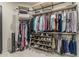 Well-organized walk-in closet with ample shelving and hanging space to maximize storage and accessibility at 7215 W Union Hills Dr, Glendale, AZ 85308