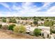 Aerial view of a golf community featuring well maintained houses and golf course views at 7818 E Cactus Wren Rd, Scottsdale, AZ 85250