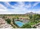 Scenic community tennis courts offering breathtaking views of a golf course and distant mountains at 7818 E Cactus Wren Rd, Scottsdale, AZ 85250