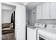 Well-equipped laundry room with modern LG appliances and convenient access to the living area at 7818 E Cactus Wren Rd, Scottsdale, AZ 85250