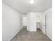 Carpeted bedroom with walk-in closet and bright windows, offering ample natural light and space at 842 E Beverly Rd, Phoenix, AZ 85042