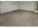 Attached two car garage with large doors and ample space for storage at 8886 S 256Th Dr, Buckeye, AZ 85326