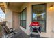 Outdoor balcony with seating and a grill, perfect for relaxing or cooking at 9711 E Mountain View Rd # 2524, Scottsdale, AZ 85258