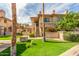 Charming two-story condo with well-maintained landscaping and a green lawn at 9711 E Mountain View Rd # 2524, Scottsdale, AZ 85258