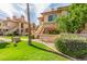 Beautiful condo complex surrounded by green lawns and colorful foliage, creating an inviting atmosphere at 9711 E Mountain View Rd # 2524, Scottsdale, AZ 85258