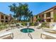 Relaxing hot tub area with comfortable lounge chairs for residents to enjoy at 9711 E Mountain View Rd # 2524, Scottsdale, AZ 85258