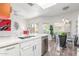 Bright kitchen featuring stainless steel appliances, breakfast bar and view to dining area at 9711 E Mountain View Rd # 2524, Scottsdale, AZ 85258