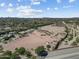 Bird's eye view of a large lot in the desert with space for parking trailers at 100 Swilling Ave, Wickenburg, AZ 85390