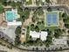 Ariel view of a community park with a pool, a tennis court and a playground at 100 Swilling Ave, Wickenburg, AZ 85390