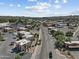 Aerial view of a street with shops, restaurants, and other community amenities at 100 Swilling Ave, Wickenburg, AZ 85390